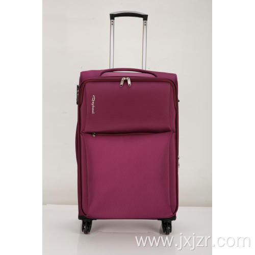 Softside Carry On Spinner suitcase